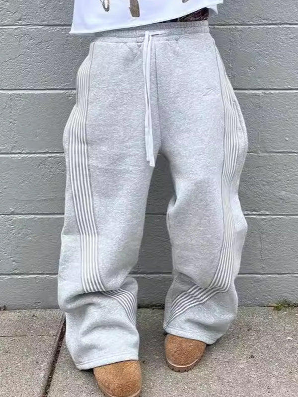 Einfarbige Sweatpants mit Vintage Print