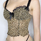 Canottiera vintage con giunture in pizzo con fiocco e stampa leopardata