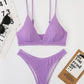 Set bikini in tinta unita a punto smock con scollo a V