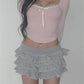 Vintage pink knit top with square neckline and lace insert