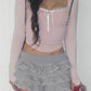 Vintage pink knit top with square neckline and lace insert