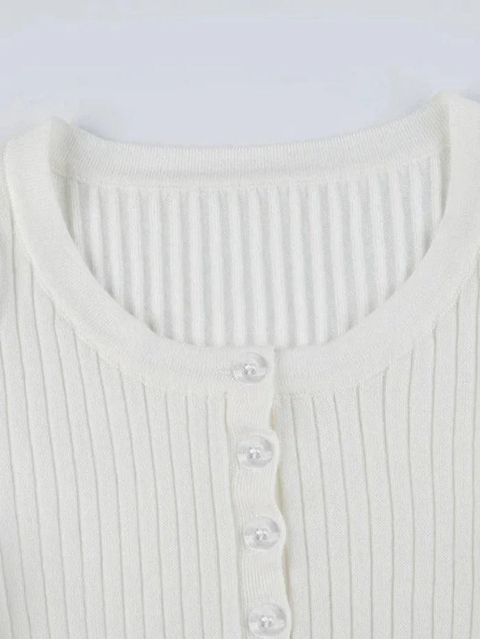 Top bianco basic in maglia a coste con abbottonatura e maniche lunghe