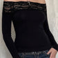 Top a maniche lunghe vintage nero con spalle scoperte e inserto in pizzo