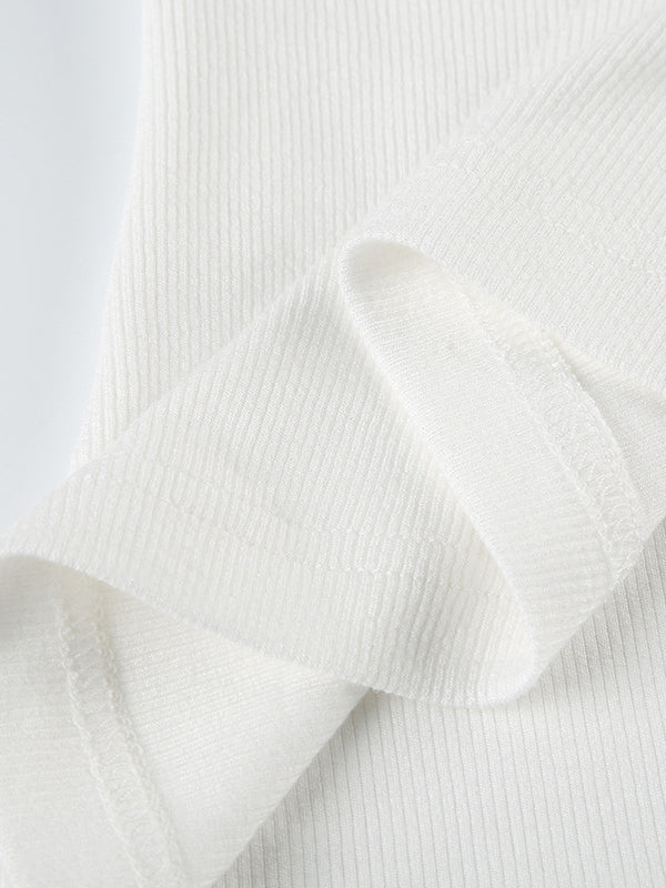 Maglia a maniche lunghe con scollo a fiocco e cuciture in pizzo bianco