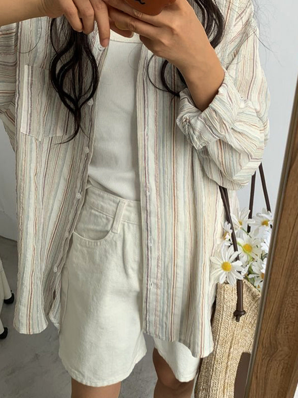 Vintage long-sleeved shirt with button placket and colorful stripe pattern