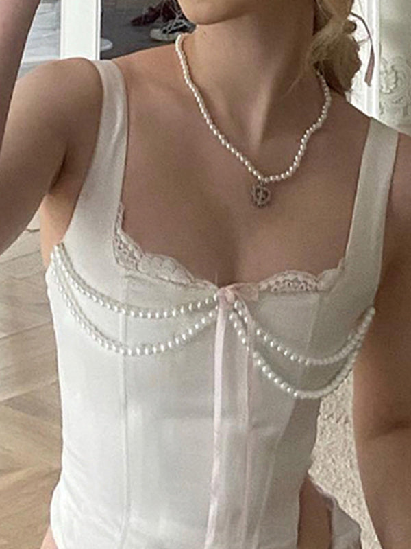 Canotta corsetto francese bianco con perline sul retro con pizzo e fiocchi