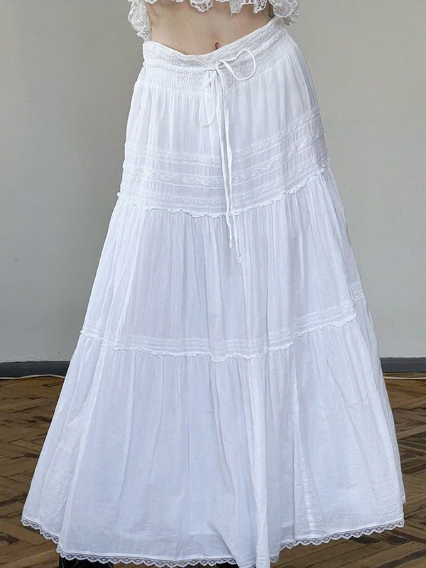 White vintage maxi skirts with lace trim and straps