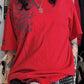 T-shirt oversize rossa hip hop con stampa di teschi e maniche corte