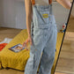 Blauer Vintage Overall mit Großen Taschen und Splash Ink Print