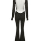 Black vintage jumpsuit with long sleeves and flared legs