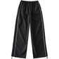 Black baggy sweatpants with piping detail