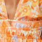 Giovanna Orange -Gekleurde mini -jurk met bloempatroon
