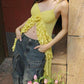 Top giallo vintage con scollo a V e volant sull'orlo