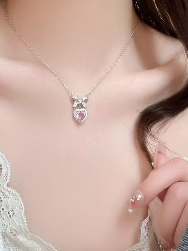 Collana con ciondolo a forma di cuore con fiocco glitterato rosa Y2K