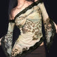 Top a maniche lunghe con stampa leopardata asimmetrica vintage e pizzo 