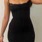 Mini abiti con reggicalze stretti in pizzo nero curvy