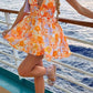 Giovanna Orange -Gekleurde mini -jurk met bloempatroon