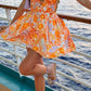 Giovanna Orange -Gekleurde mini -jurk met bloempatroon