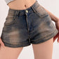 Blaue Vintage Distressed Denim Shorts mit Wascheffekt