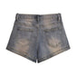 Blaue Vintage Distressed Denim Shorts mit Wascheffekt