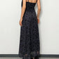 Black vintage maxi dress with generous neckline and slim fit