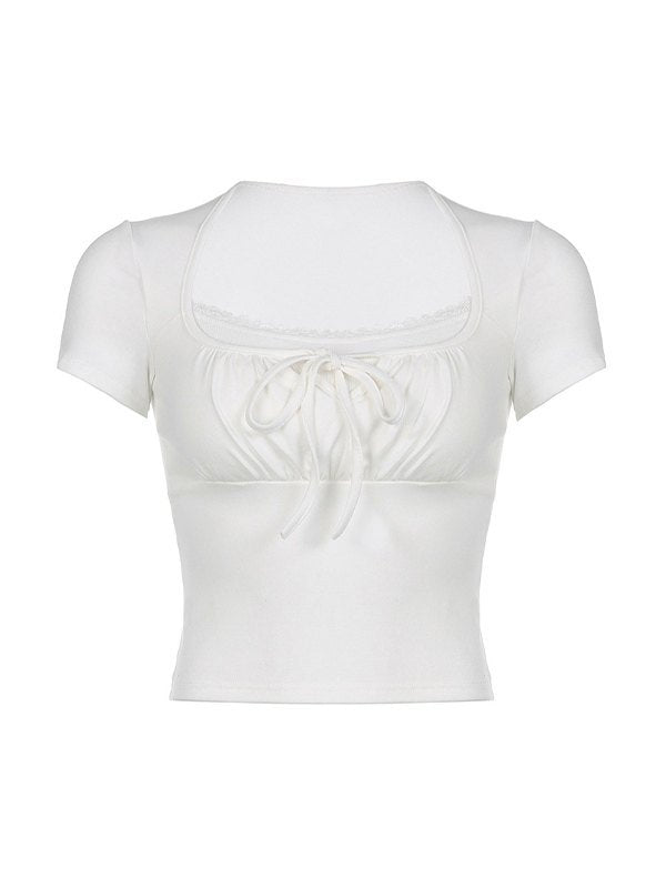 Top corto vintage bianco con dettaglio nodo e patchwork