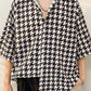 Black vintage men's shirt in houndstooth pattern with button placket