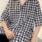 Black vintage men's shirt in houndstooth pattern with button placket