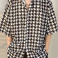 Black vintage men's shirt in houndstooth pattern with button placket