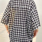 Black vintage men's shirt in houndstooth pattern with button placket