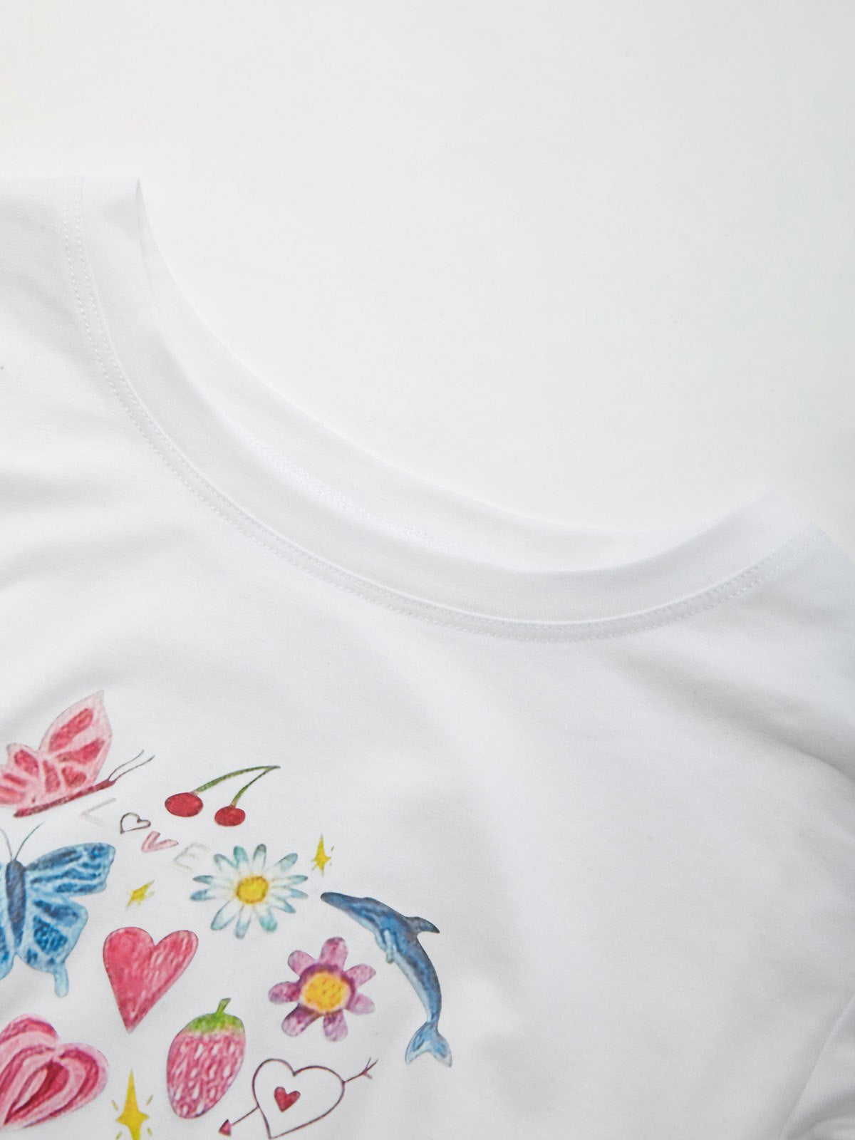 Vintage crop top with white fruit and butterfly print