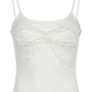 Top con spalline in pizzo bianco con fiocco