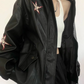 Giacca in pelle nera con collo a revers e ricami